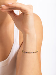 14K gold Tennis bracelet. gold ball, pink sapphire